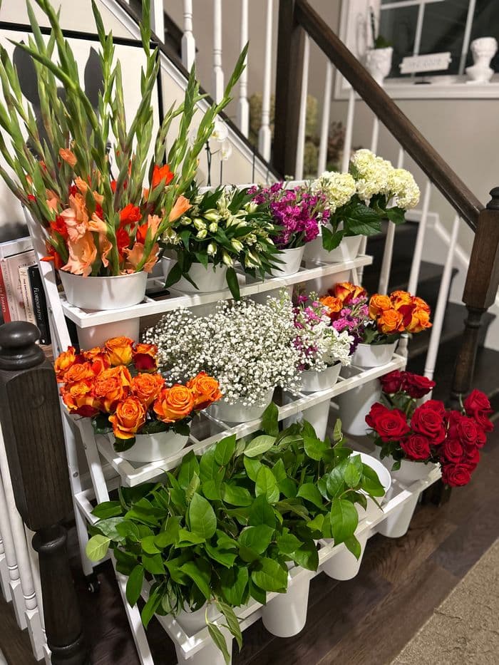 Bloom bar station with roses, gladiolus, and seasonal flowers