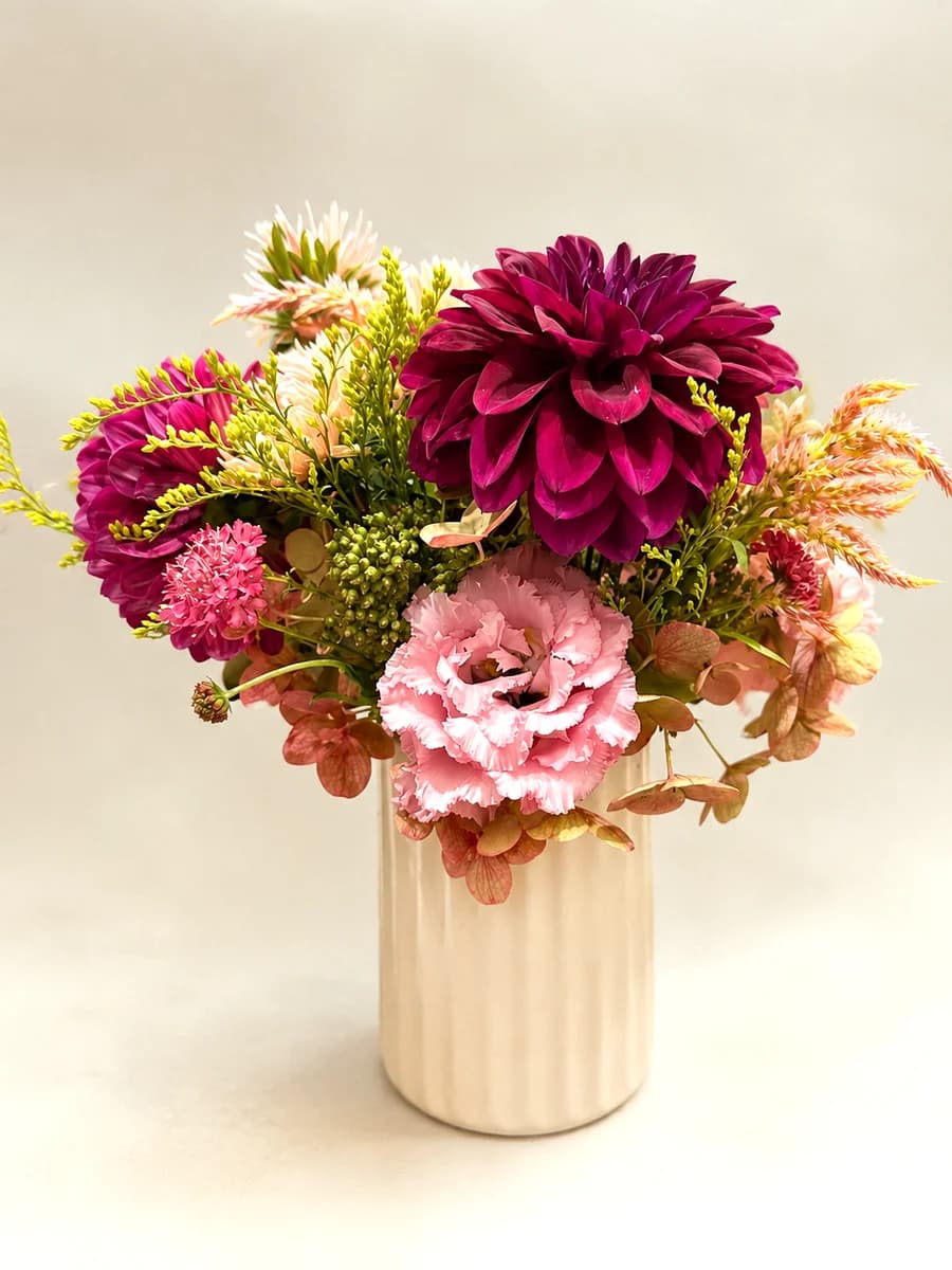 The Sienna - autumn arrangement of magenta dahlias, antique hydrangea, and golden solidago in a cream vase